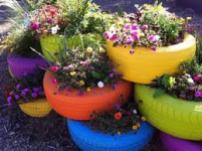 Paint old tires to use as planters